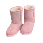 Pair of pink Australian sheepskin wool fur boots with white soles on a white background