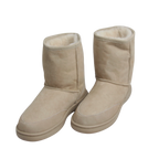 Pair of outdoor beige wool, Australian sheepskin suede boots with white fur lining on a white background