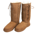 Pair of outdoor brown suede Australian sheepskin, wool boots with white fur lining on a white background