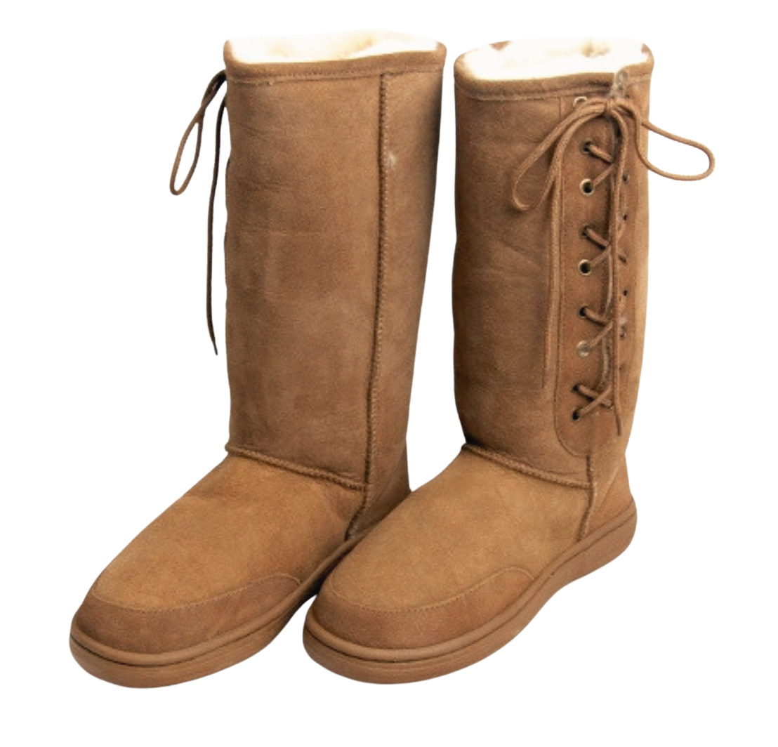 Pair of outdoor brown suede Australian sheepskin, wool boots with white fur lining on a white background