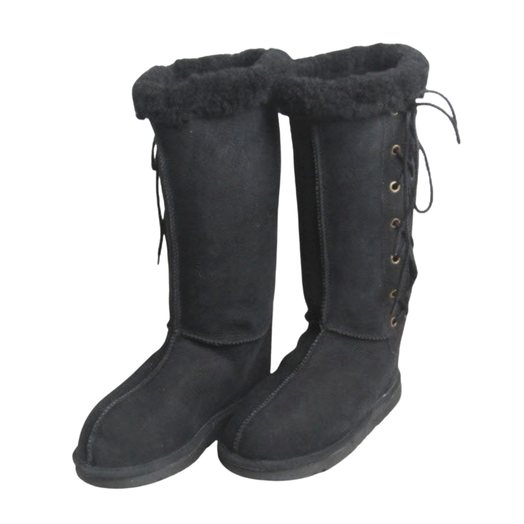 Pair of black knee-high lace up boots with wool Australian sheepskin fur lining on a white background
