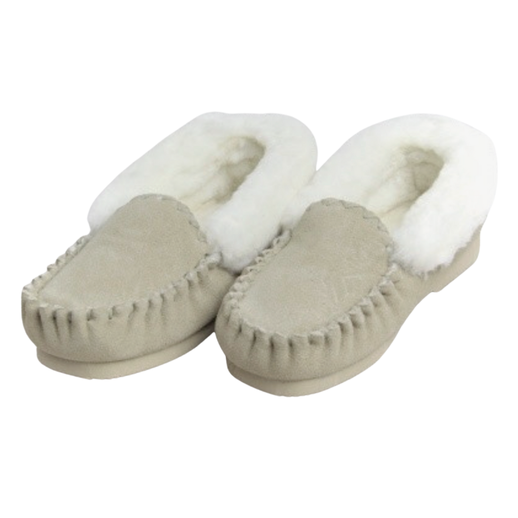 Pair of beige moccasin slippers with white Australian sheepskin wool fur lining on a white background