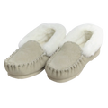 Pair of beige moccasin slippers with white Australian sheepskin wool fur lining on a white background