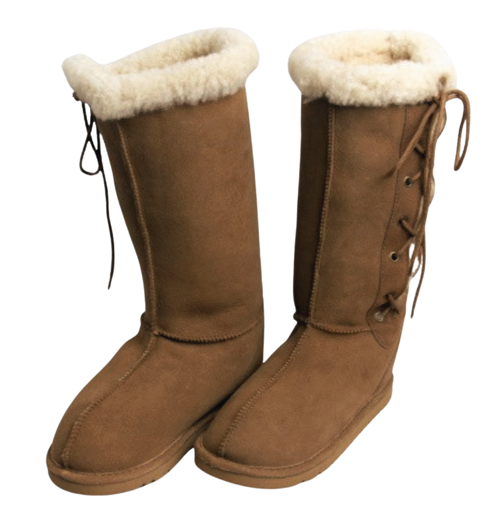Pair of knee high lace up brown suede boots with white Australian sheepskin wool fur lining on a white background